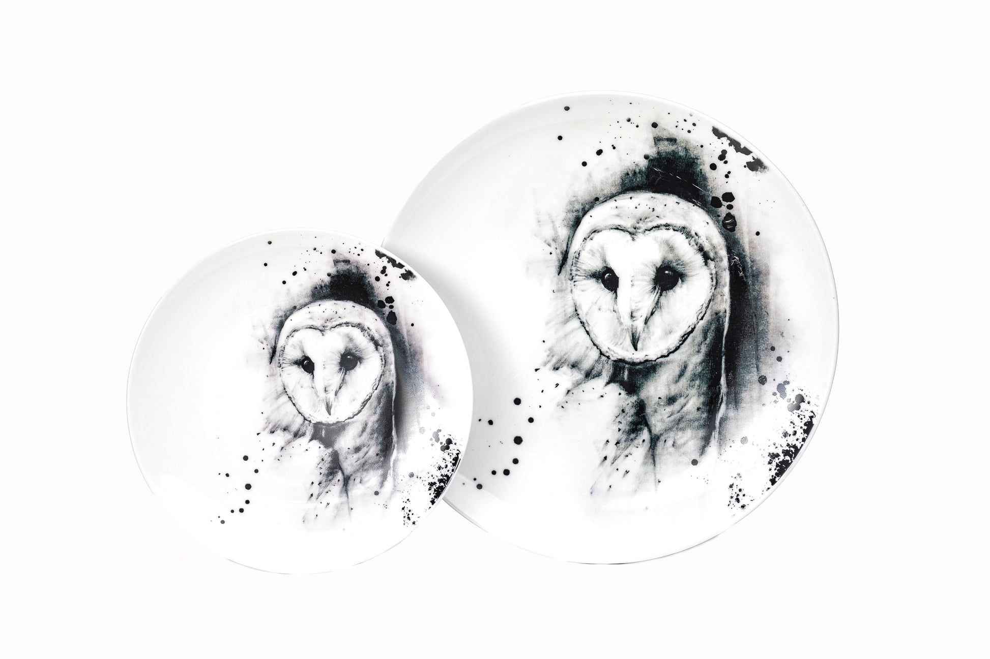 Dinnerware set of 4, 6, 8 containing one white porcelain dinner plate, and one salad plate each with Barn Owl illustration and black ink splatter dishwasher and microwave safe product photo on white background
